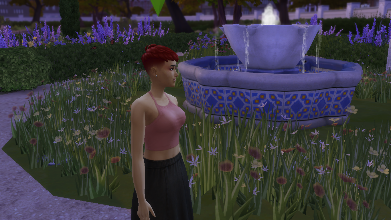 A player character in The Sims 4 enjoying a walk outside near a water fountain.