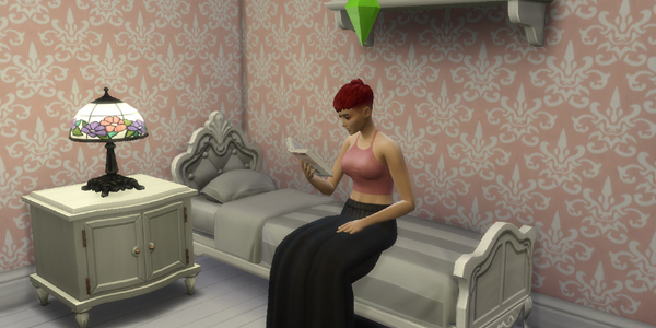A player character from The Sims 4 sitting on her bed reading a book.
